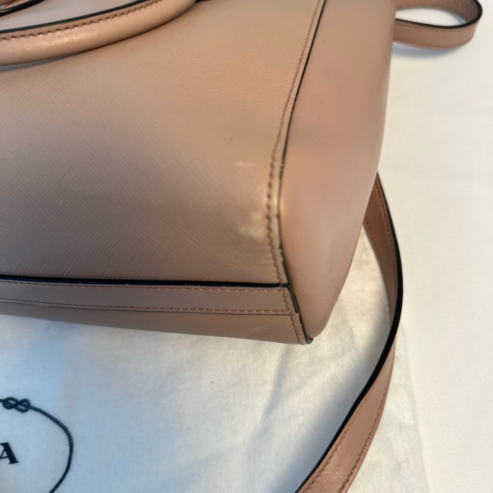 Authentic crossbody and double handle tote from Prada in a pinkish beige. - Picture 14 of 15